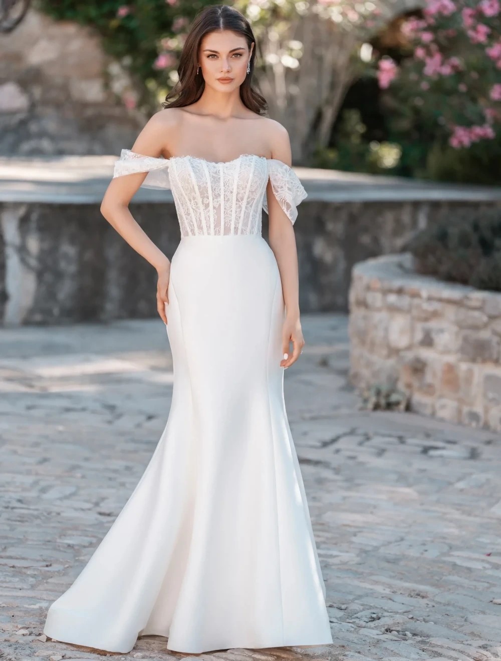Model wearing a white Allure gown